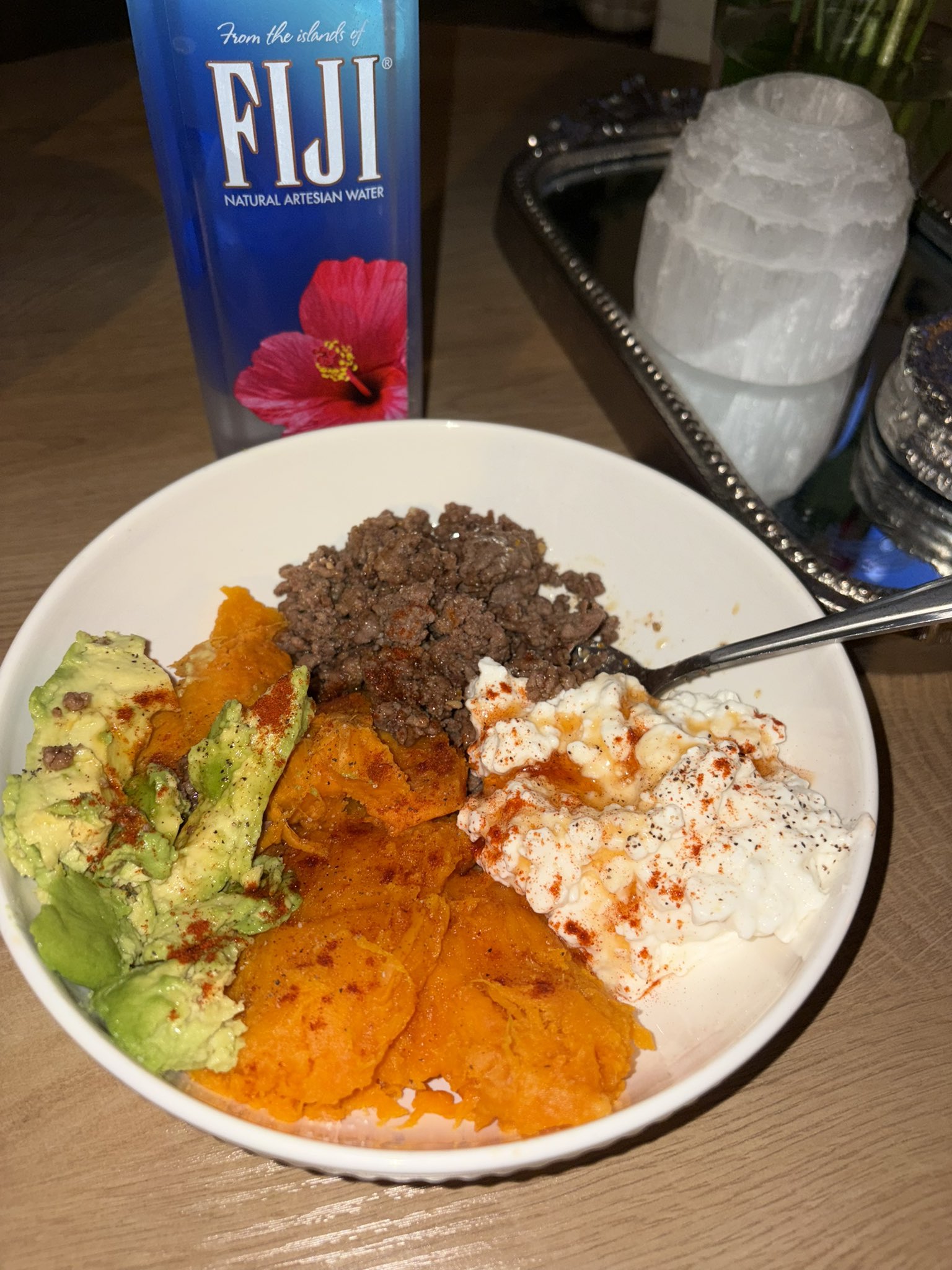 High-protein staple meal: baked sweet potato, ground beef, cottage cheese, and avocado